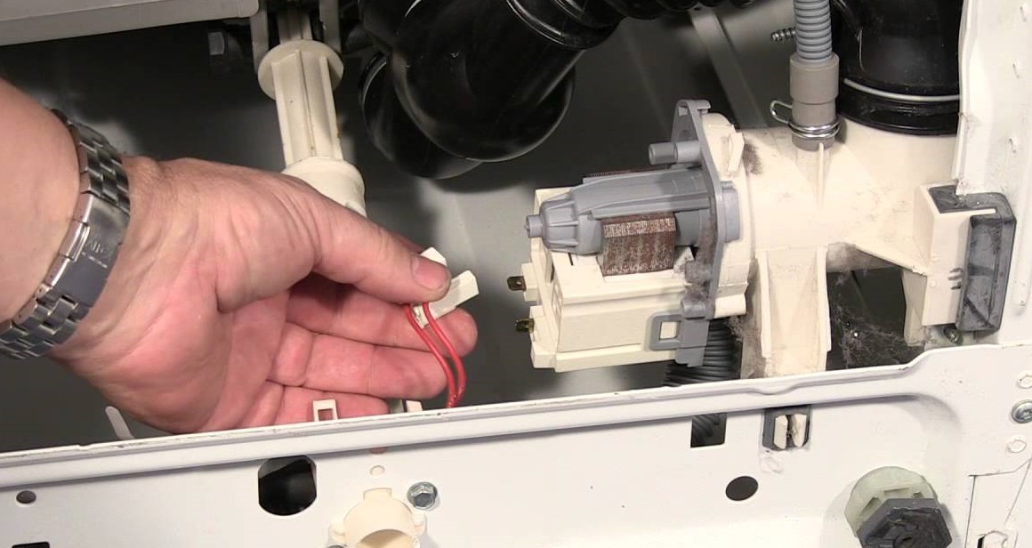 Let's get the Zanussi pump out and clean it.