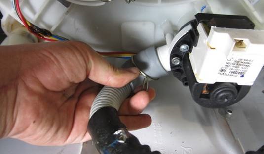 we detach the drain hose from the pump snail