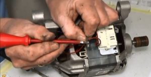The process of replacing brushes on an Electrolux motor