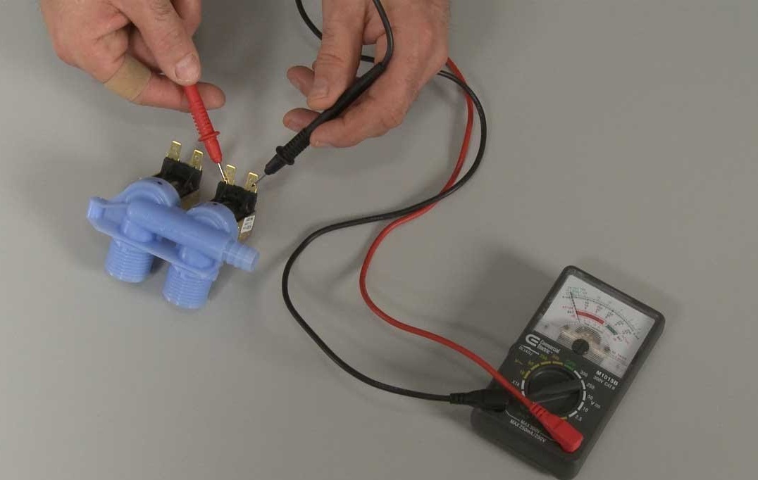What is the voltage at the water inlet valve in a washing machine?