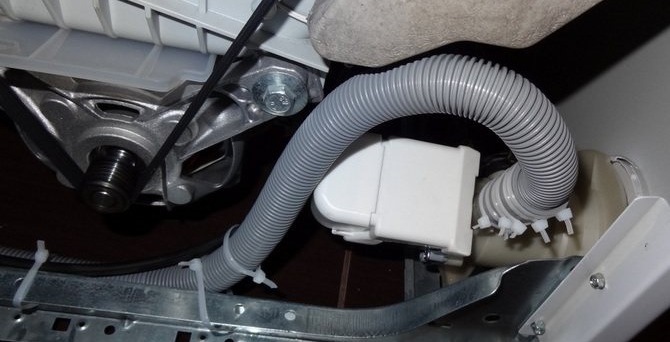 disconnect the hose from the washing machine