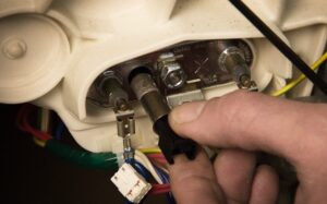 Как да сменя температурния сензор в пералня?