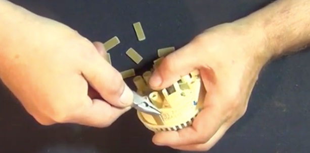 We are preparing to open the pressure switch housing.