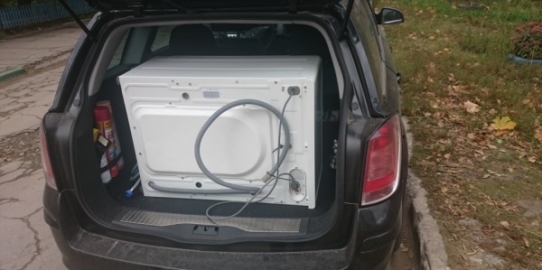 washing machine on its side