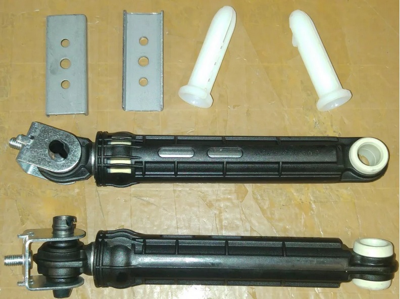 How a washing machine's shock absorber and damper work