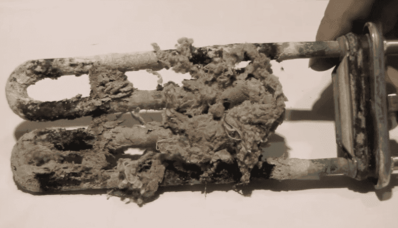 The heating element is covered with scale