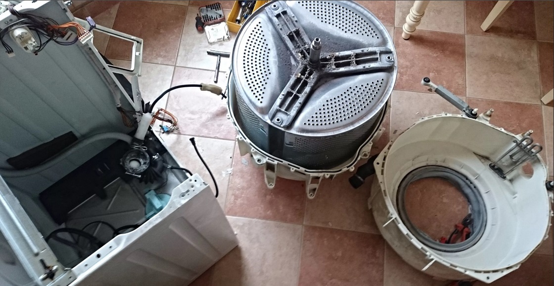 disassembling the washing machine's drum