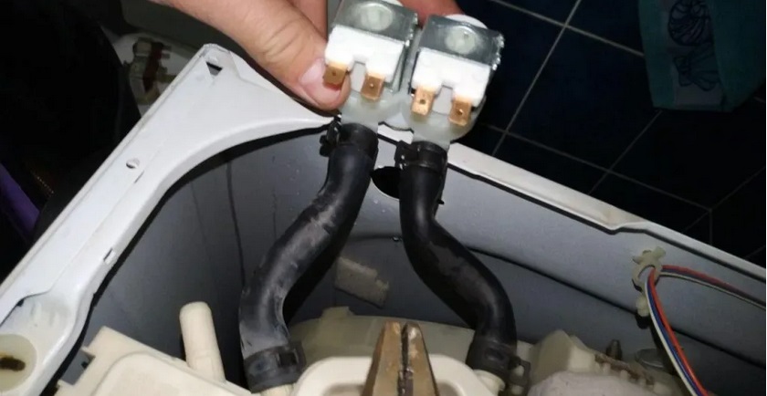 remove the inlet valve from the machine