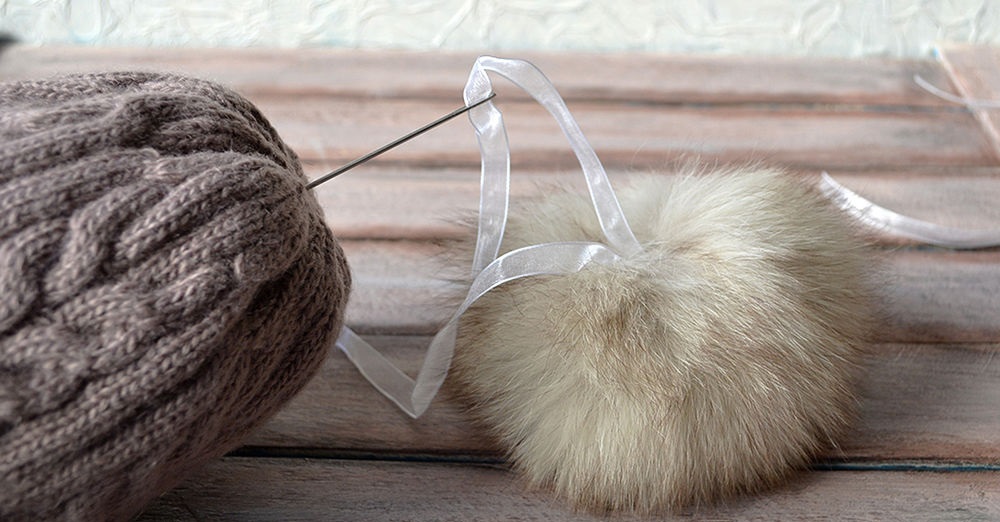 How to sew a pompom to a hat