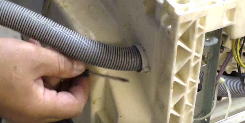 remove the dishwasher drain hose