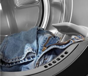 Can you dry jeans in a clothes dryer?