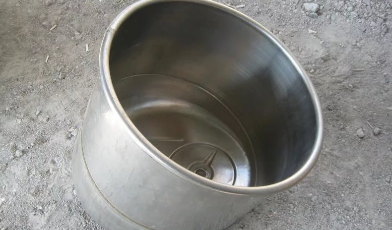 a tank from an old washing machine for a disposer