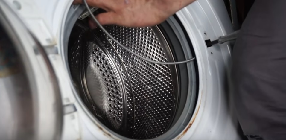 hold it with a screwdriver and put on the clamp