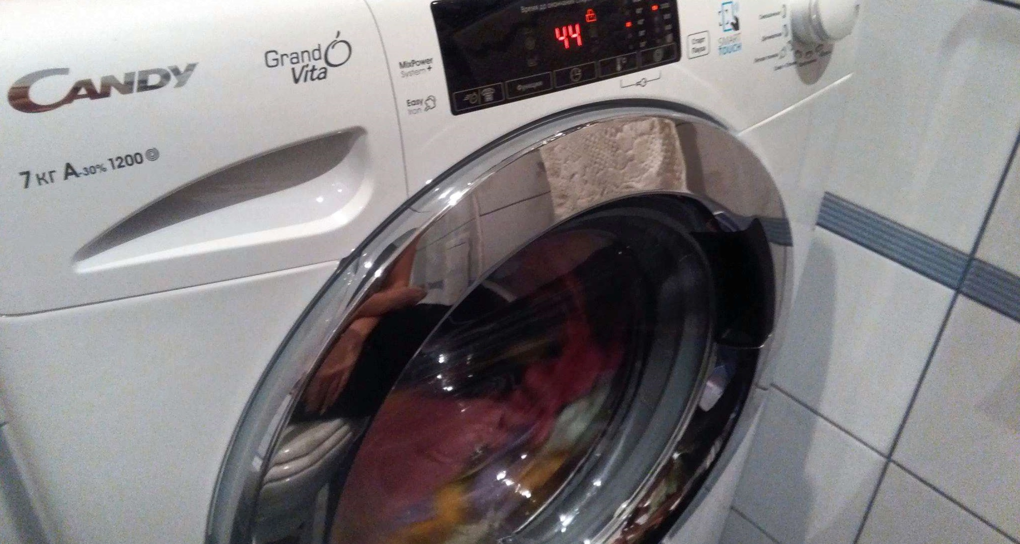 loading laundry into the SM Candy drum