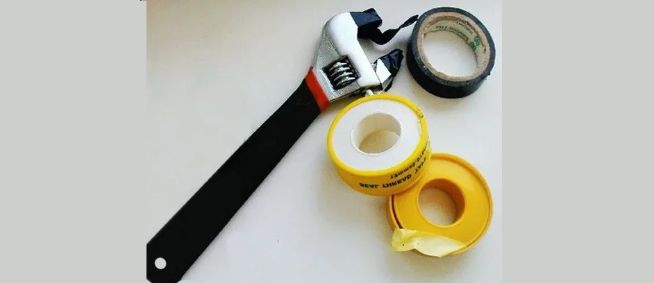 I need an adjustable wrench and FUM tape.