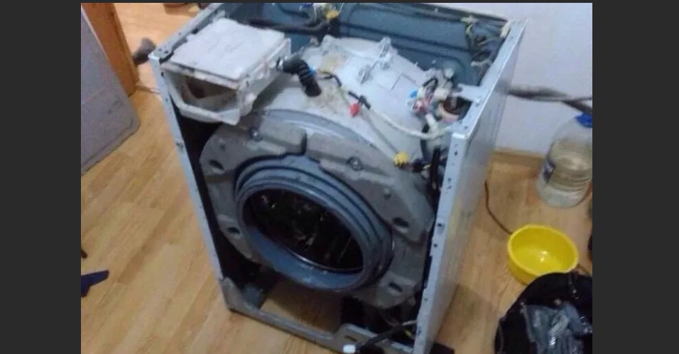 Removing the front panel of the Haier washing machine