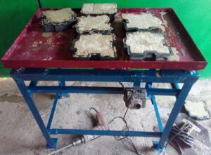 Вибрираща маса, изработена от двигател на пералня