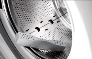 Пластмасово ребро се счупи в барабана на пералнята.