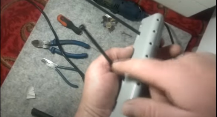 we thread plastic clamps through the holes