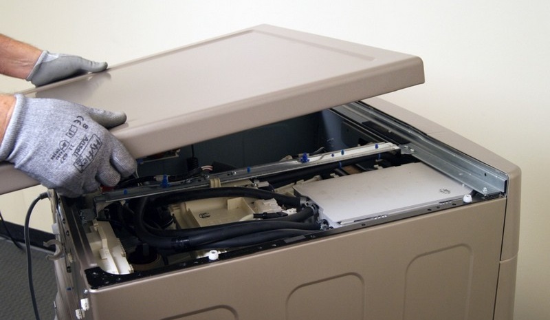 remove the cover of the Samsung machine