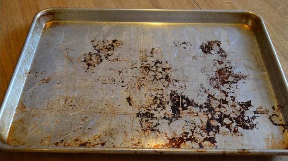 a large dirty baking sheet