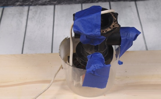 we place the pump in the container and close the outlets