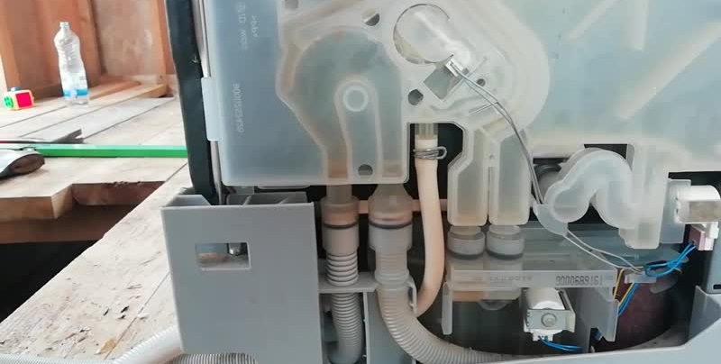 hoses and pipes inside the dishwasher