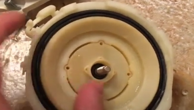 remove the cover covering the PMM pump anchor