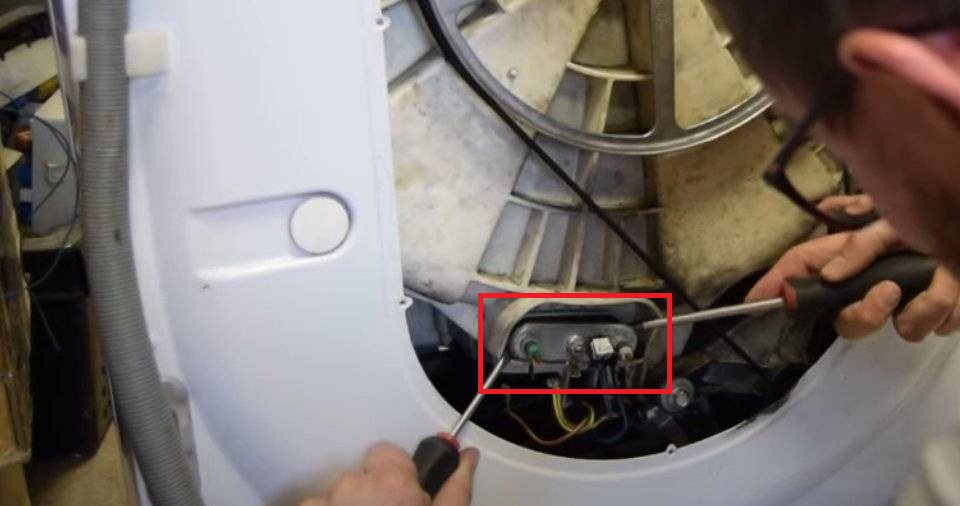 Where is the heating element located on the washing machine?