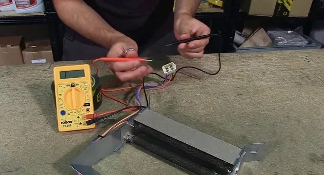 checking the dryer's heating element