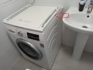 How to place a dryer on top of a narrow washing machine?