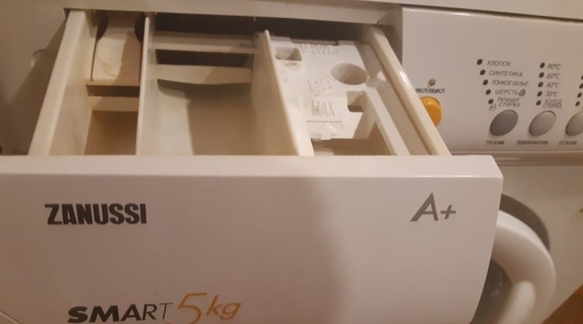 The purpose of all the compartments in the Zanussi washing machine tray