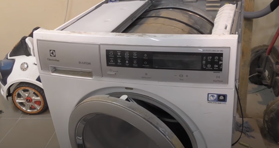 remove the top cover of the dryer