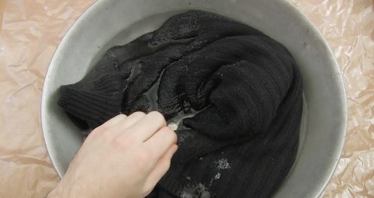 soak the sweater in clean, cool water