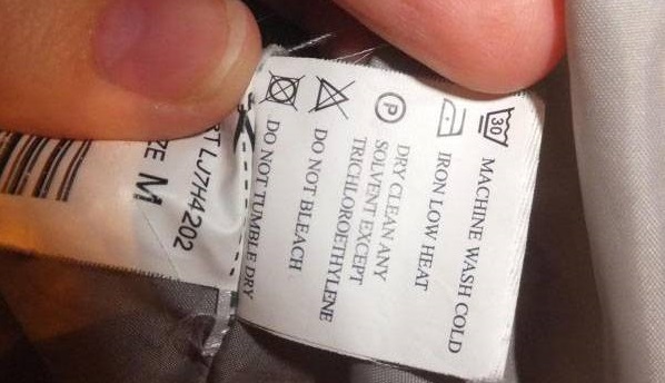 Care instructions for camel wool jackets on the tag