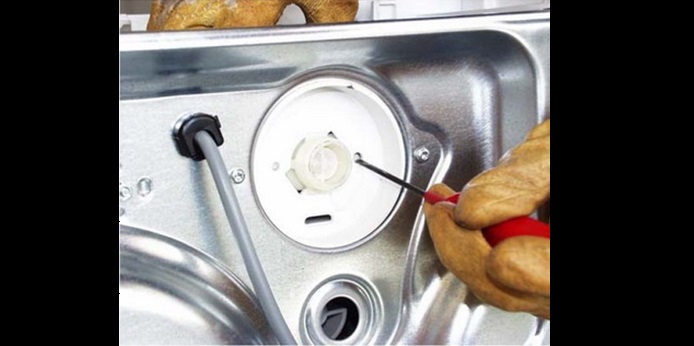 press on the latches and remove the valve