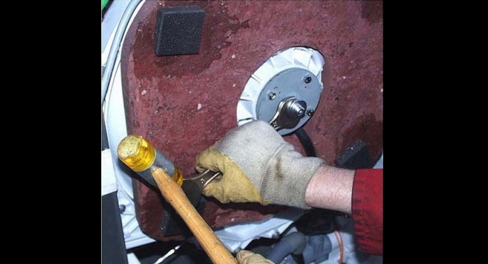 unscrew the drum screw on the right