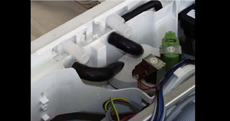 unscrew the filler hose and remove the pipe clamps