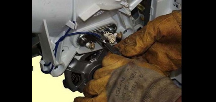 we disconnect the wires from the heating element and loosen its nut