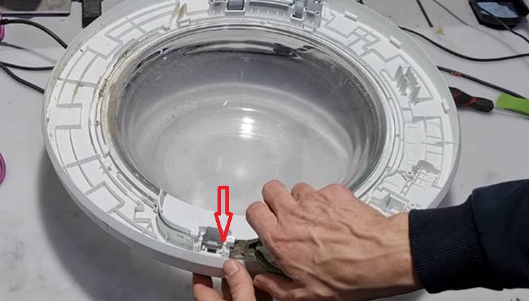 we remove the steel rod from the door mechanism