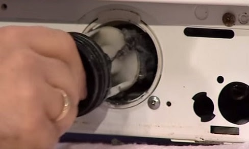 We drain the water through the machine's filter