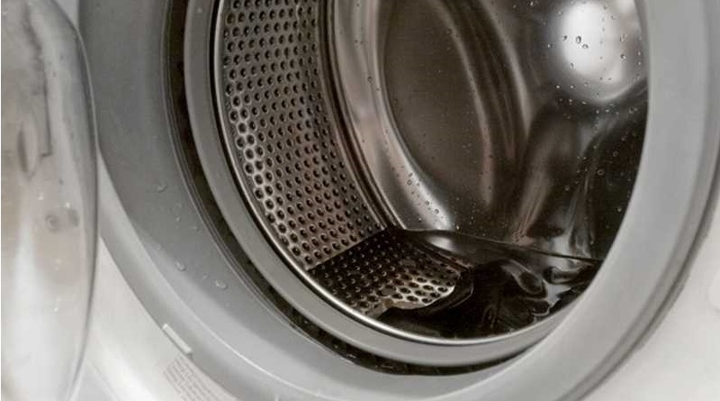 we scoop out water from the drum of the machine