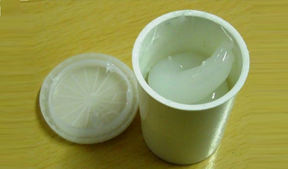 What type of lubricant should be used for washing machine shock absorbers?