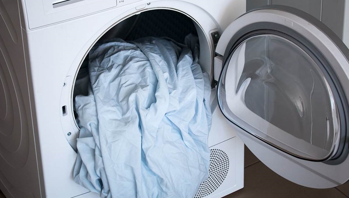 a lot of laundry in the dryer