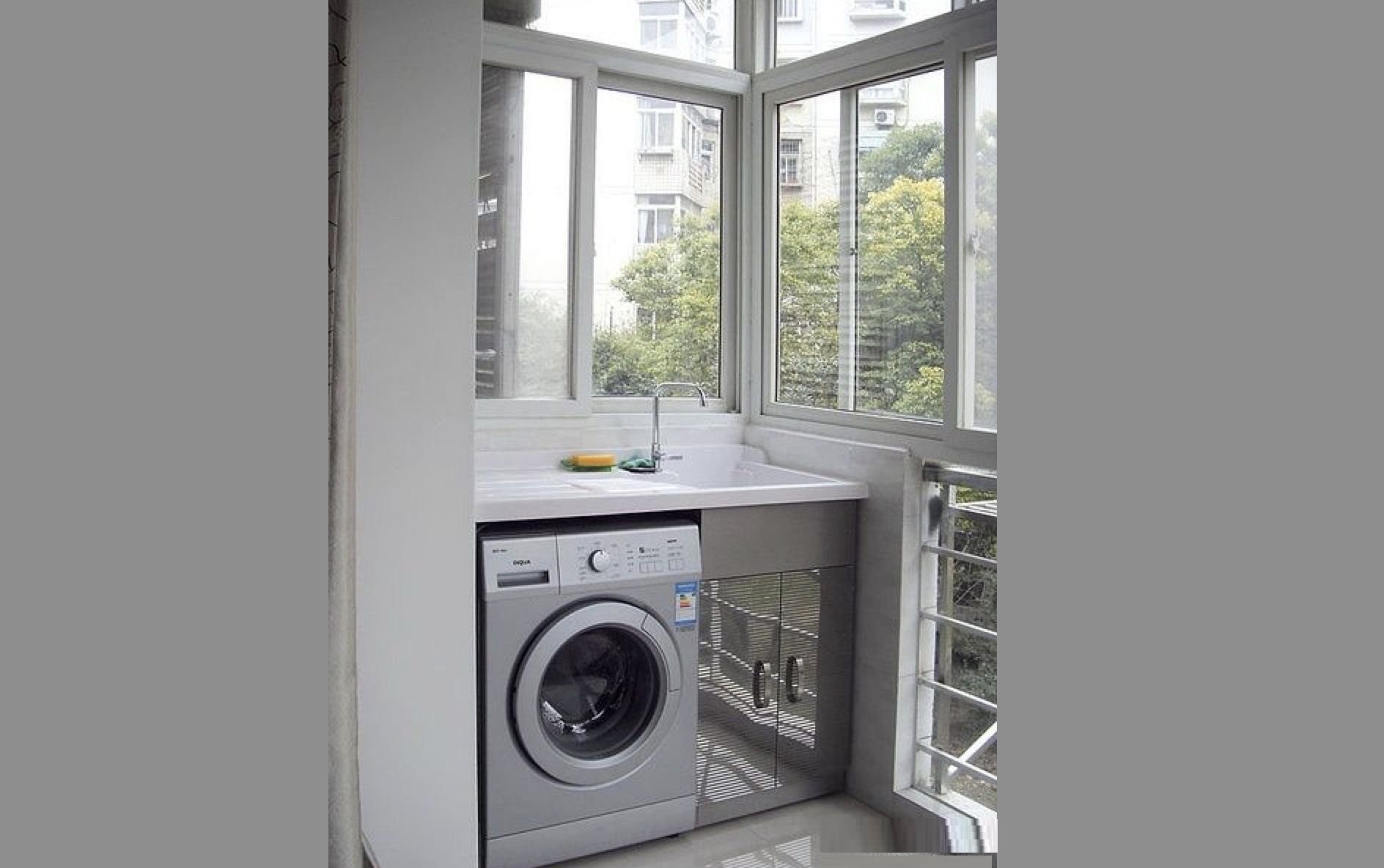 a clothes dryer on the balcony