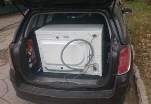 Can a tumble dryer be transported on its side?