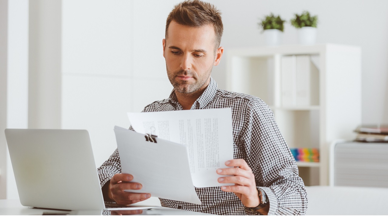 a man reading documents